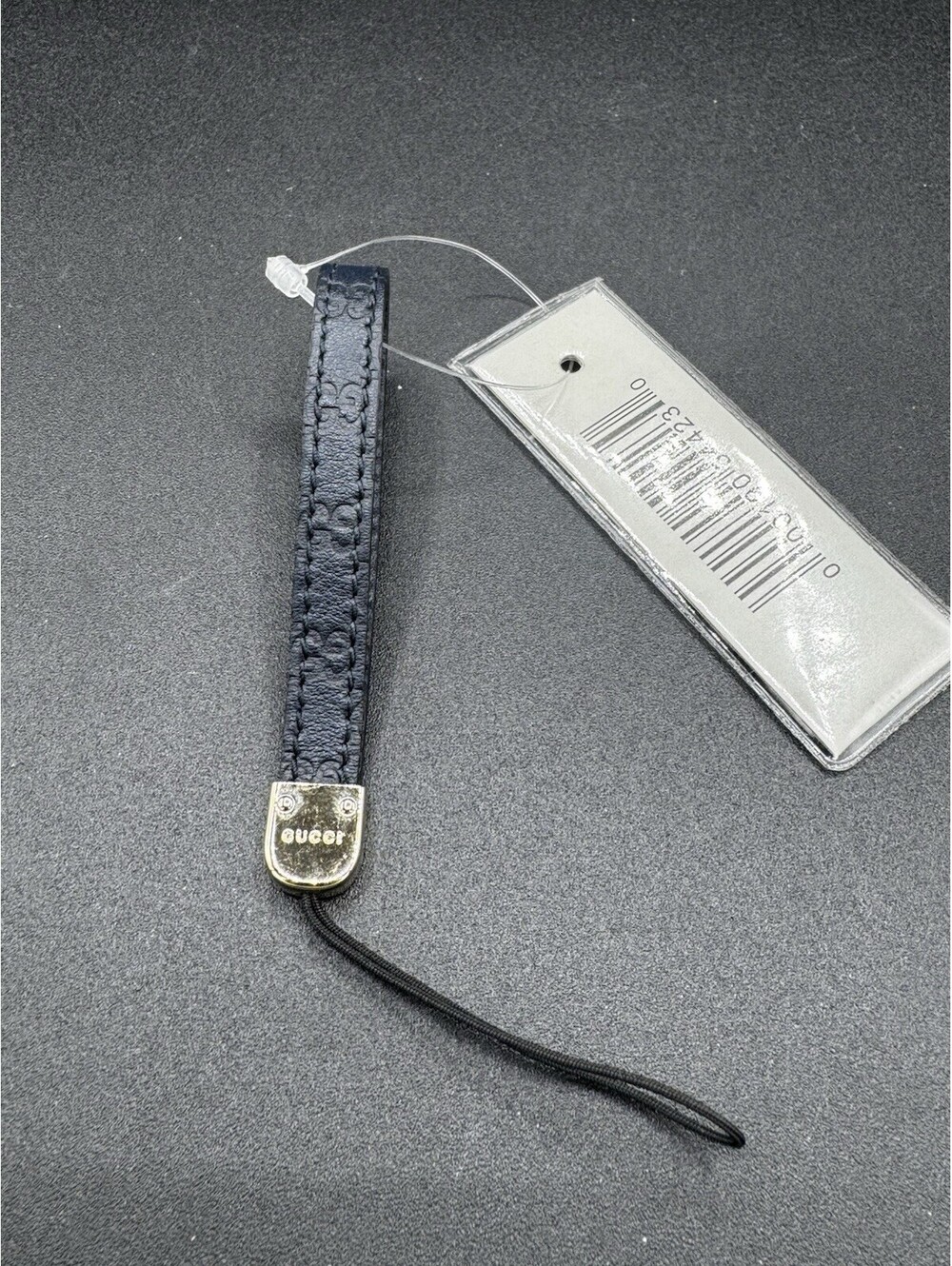 Gucci GG Monogram Leather Wrist Strap Lanyard Black Gold Tone w/ Original Tag